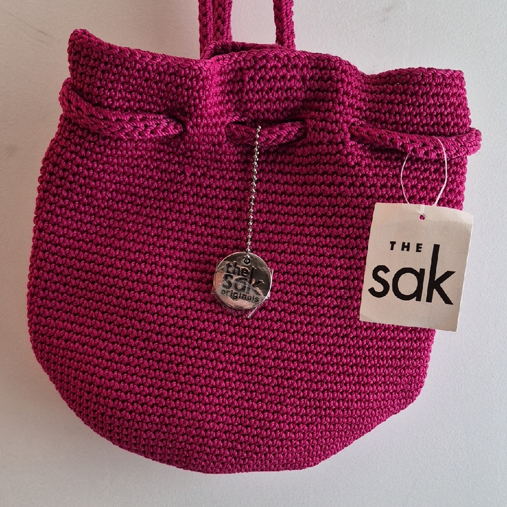 The Sak Raspberry Crochet Drawstring Shoulder Bag
